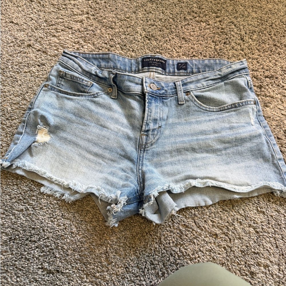Lucky Brand Light Blue Distressed Denim Cutoff Shorts.